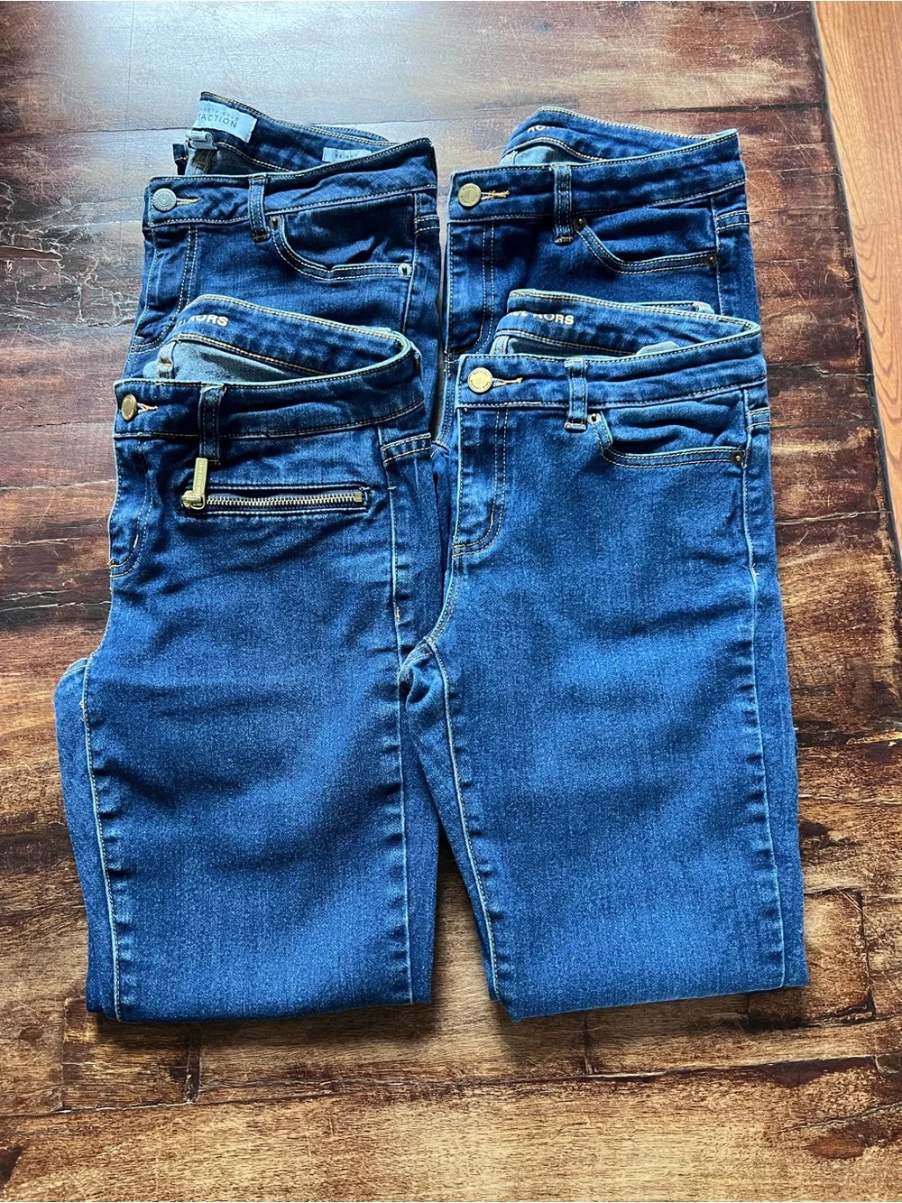 Michael Kors skinny jeans (3) and Kenneth Cole (1), lot of 4, great condition.